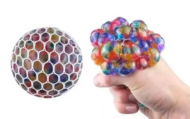 NI.SQUISHY PELOTITAS EN RED ANTIESTRES       BRILLOSAS 11072